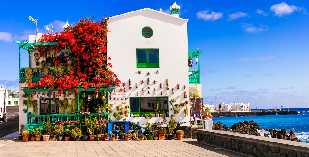 white house in punta mujeres decorated with flowers